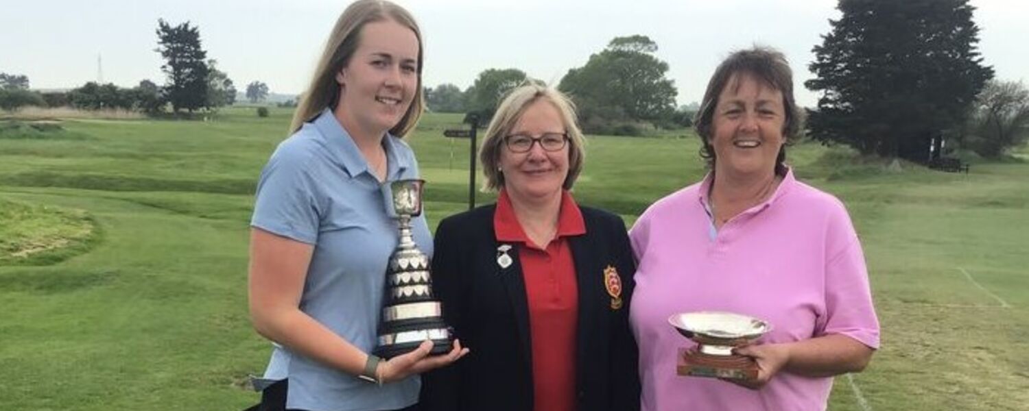 2022 LADIES AND SENIORS CHAMPIONS KATY YATES & GILL HAYSHAM WITH COUNTY PRESIDENT